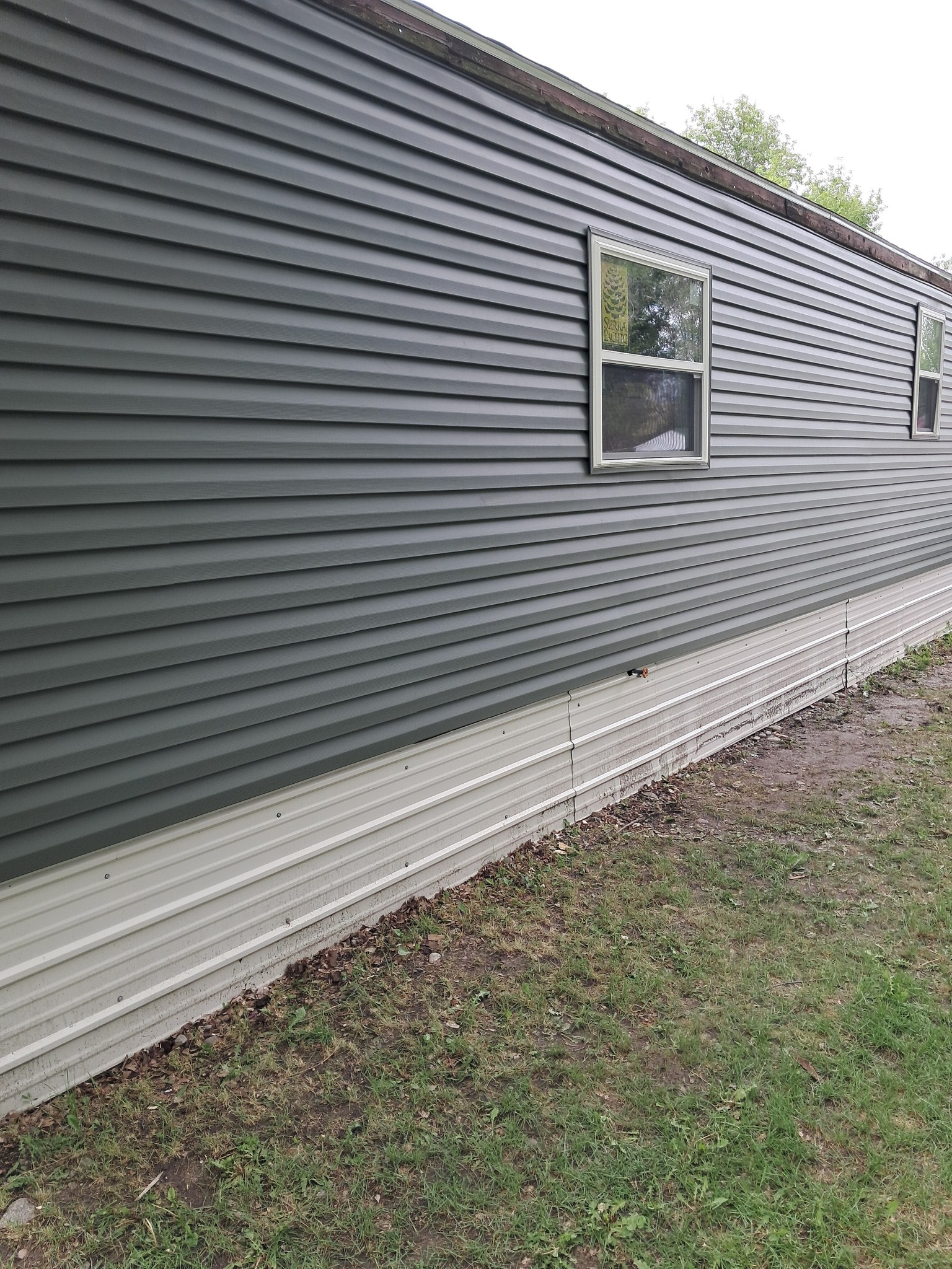 Gray lap siding installation Billings Montana American Armour